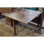 A 19th Century oak drop leaf table