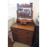 An Edwardian satinwood dressing chest of three drawers