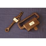 An antique (possibly Middle Eastern) cast iron three part lock and key,