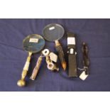 A mixed lot comprising of two hand held magnifying glasses with ornate handles,