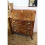 A mid 19th Century mahogany three drawer bureau on splay feet