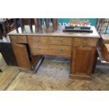 A 19th Century oak two door four drawer sideboard