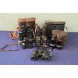 A mixed lot comprising of seven various pairs of 20th Century binoculars including Le Mare Fab