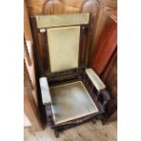 An Edwardian stained beech rocking chair