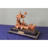A late 20th Century Indian carved sandalwood centre piece,