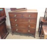 An early 19th Century five drawer mahogany chest with original knobs