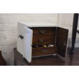 An Edwardian painted mahogany table chest with contents