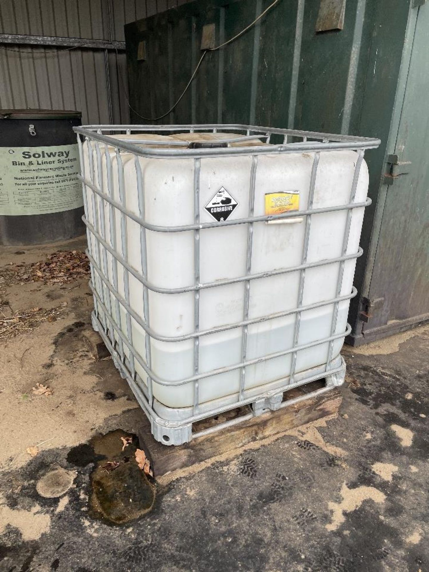 1000L IBC Container with approx 200 - 250L of Traffic Film Remover.