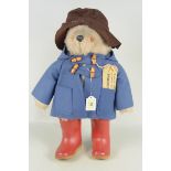 A 1970's Paddington Bear by Gabrielle Designs with Dunlop boots and original travel label,