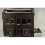 An early 20th Century scratch built dolls house and furniture