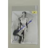 A signed photograph of Jamie Lee Curtis etc