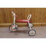 A vintage 1970's Raleigh 'Little Lamb' tricycle (rust spots to metal)