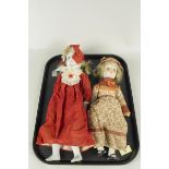 Two vintage dolls with bisque head and limbs,