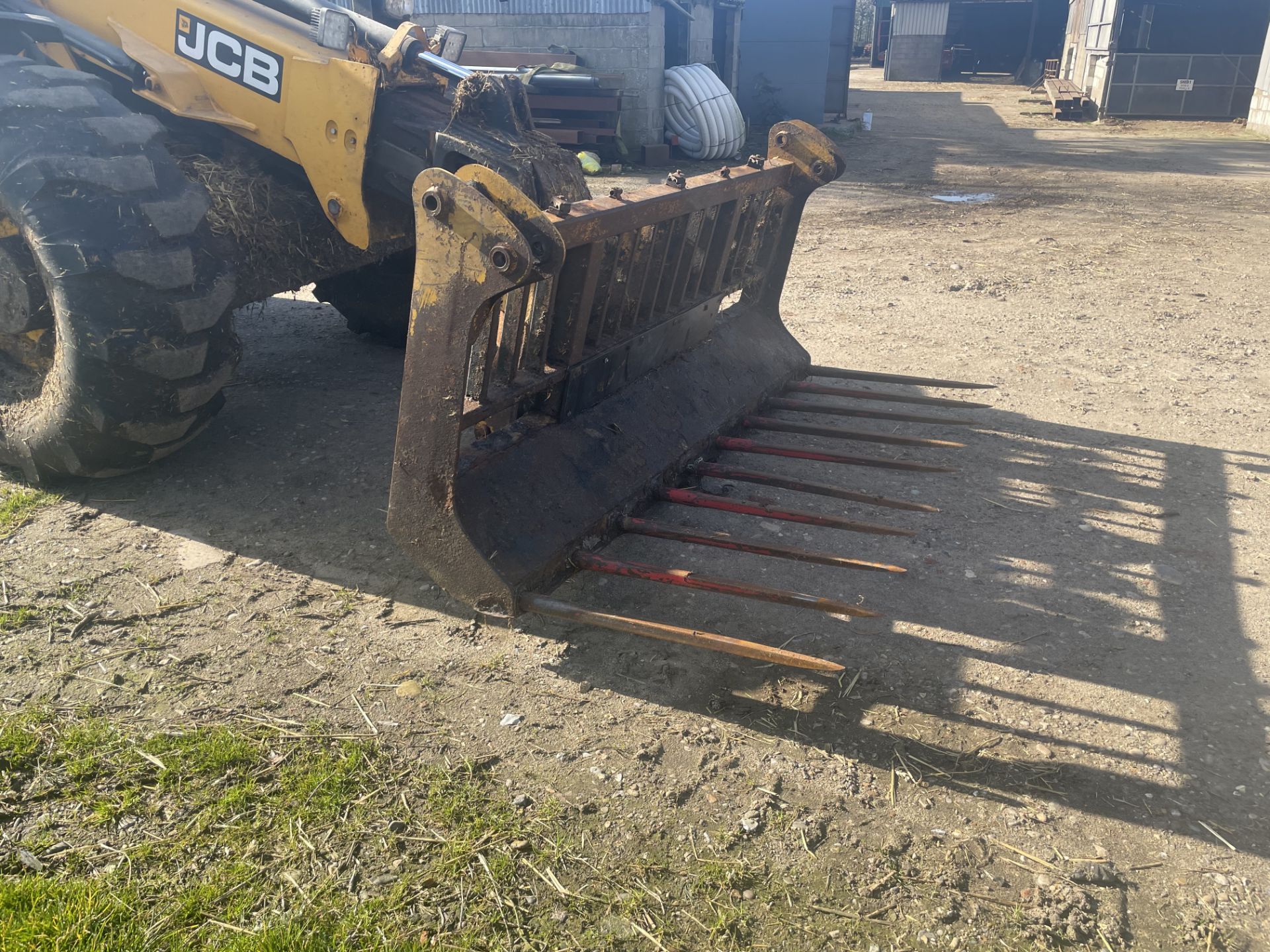 Muck Fork and Grab, pin and cone head stock. Stored near Beccles, Suffolk.