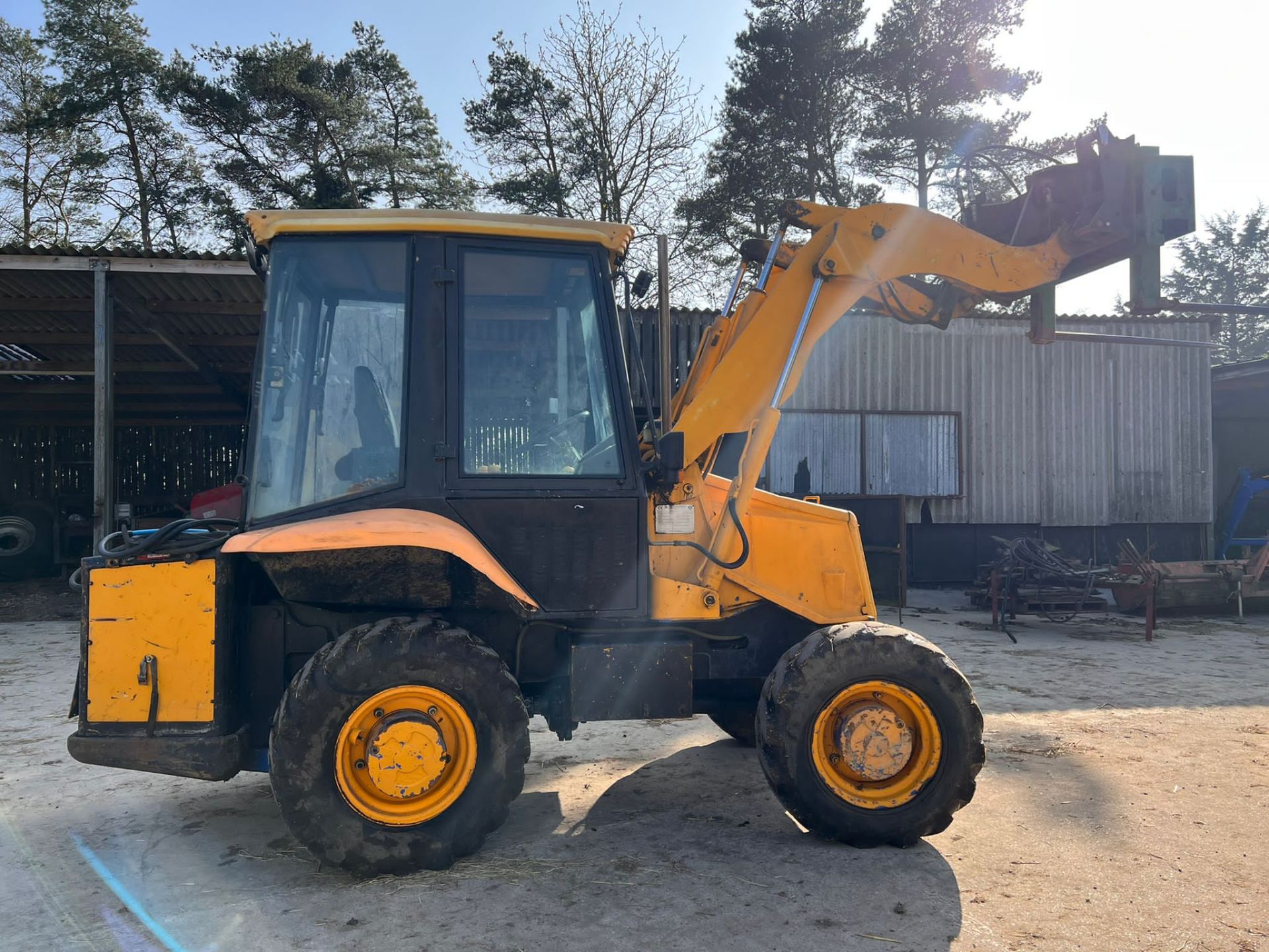 JCB 2CX 4 wheel steer comes with road compressor on the back, euro hitch on loader, 3rd service,