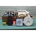 Two boxes of approx twenty four wall clocks,