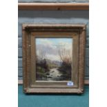 A late 19th Century oil on canvas of a river scene with figure near a cottage with hills in the