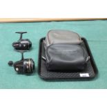 A 1988 Abu Garcia Diplomat 844m closed face reel with spare spool,