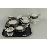 A black and white part tea set,