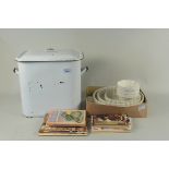 A vintage enamel bread bin, cookery booklets,