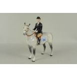 A Beswick horse with female rider, height 21.