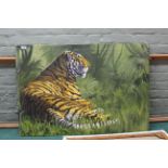 An unframed oil on canvas of a resting tiger,