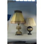 A dark blue and gilded pottery lamp base plus a gilded brass lamp base in the French Empire style