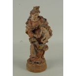 A carved wooden figure of the Madonna and Child,