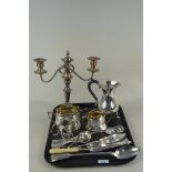 A mixed lot comprising of various EPNS including a three light candelabra, hot water pot,