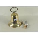 A timeworn brass ship's bell,