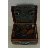 An Edwardian fitted leather gentlemans travelling case with fittings,