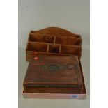 A Victorian mahogany and leather clad travelling writing slope with watered silk blue lining,