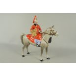 A Beswick Life Guard mounted on a dapple grey horse,