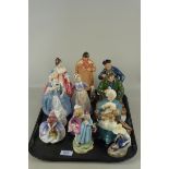 A large collection of Royal Doulton figures including 'A Good Catch', 'The Shepherd', 'River Boy',