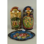 Two turned wood sets of Russian seven nested dolls,