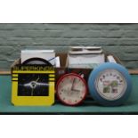 Two boxes of approx twenty four wall clocks,