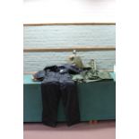 A fully lined and insulated sea fishing one piece suit, a pair of size 9 sea boots with inserts,