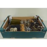 A box of mixed metal ware including silver plate, brass, a small clock,