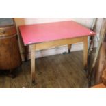 A vintage formica topped dining table with splayed legs