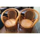 A pair of bentwood and cane chairs