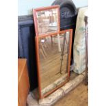 A rectangular teak framed wall mirror and one other