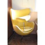 A 1960's style yellow wing back egg chair (as found)