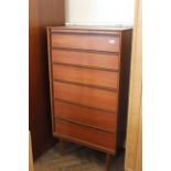 An Austinsuite of London teak chest of six drawers standing on tapered legs