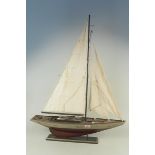 A model sailing yacht on stand,