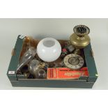 A box of oil lamp parts,