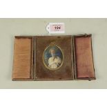 A Victorian cased picture miniature with portrait of a lady in brown leather case,