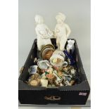 A box containing a pair of vintage chalk/plaster Dutch boy and girl figures plus the contents of a