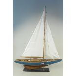 A model sailing yacht on stand,