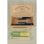 A Platignum Golden Quick Chance fountain pen, two Platignum 100's, a boxed Parker,