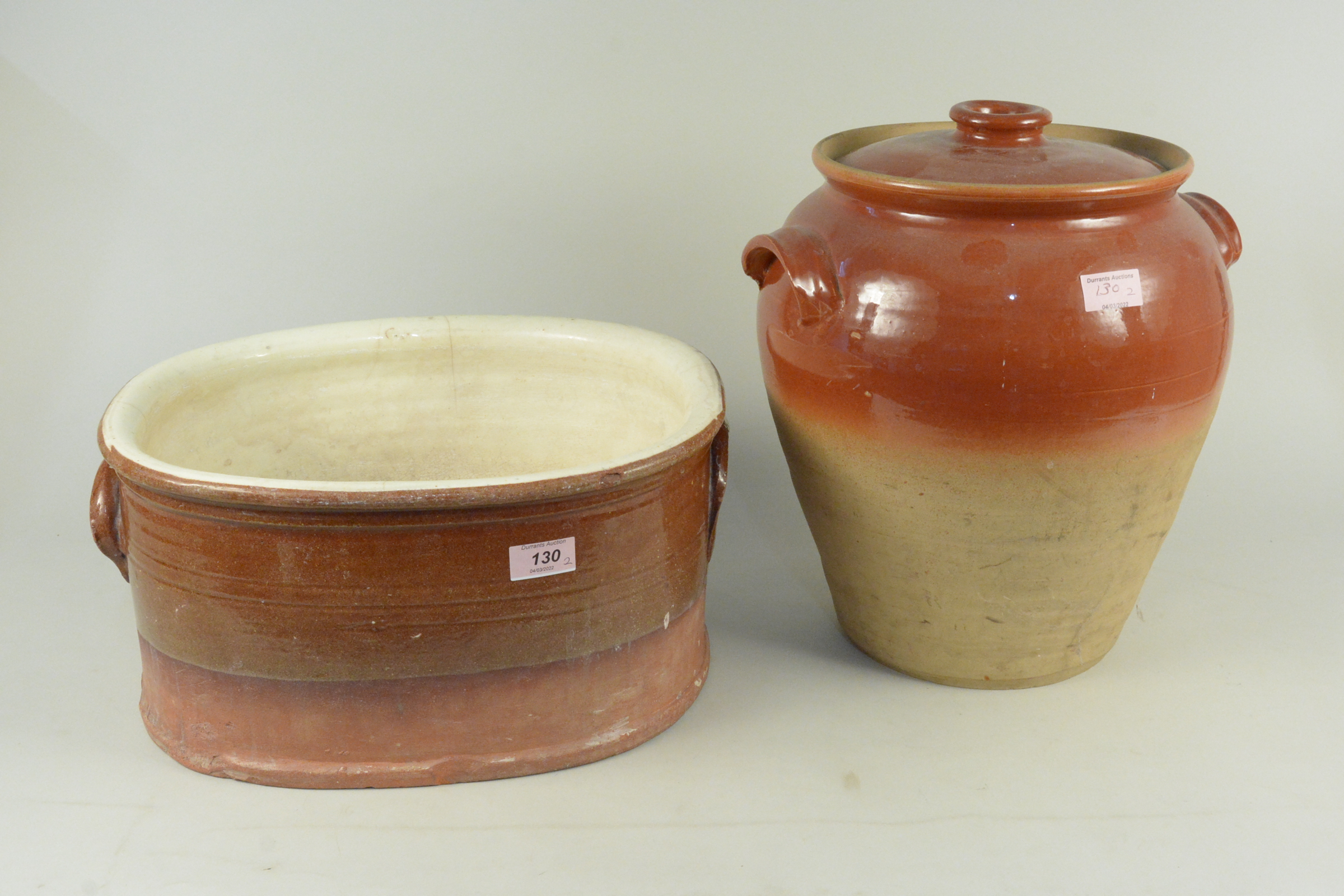 A 19th Century Staffordshire slipware footbath plus a glazed stoneware two handled container